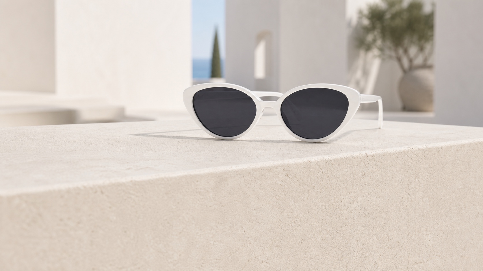 White cat-eye sunglasses in a sunlit gallery, edit sunglasses